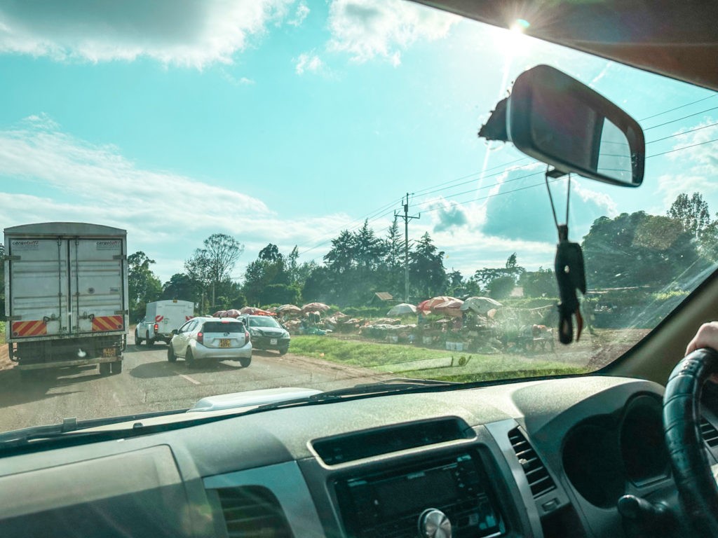 Camping in Kenya with a 4x4 vehicle, driving left the busy roads of the country.