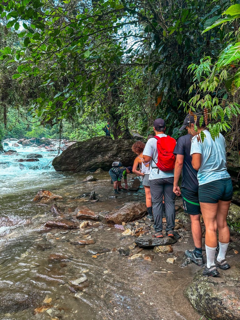 The Lost City trek leading through jungle and across rivers