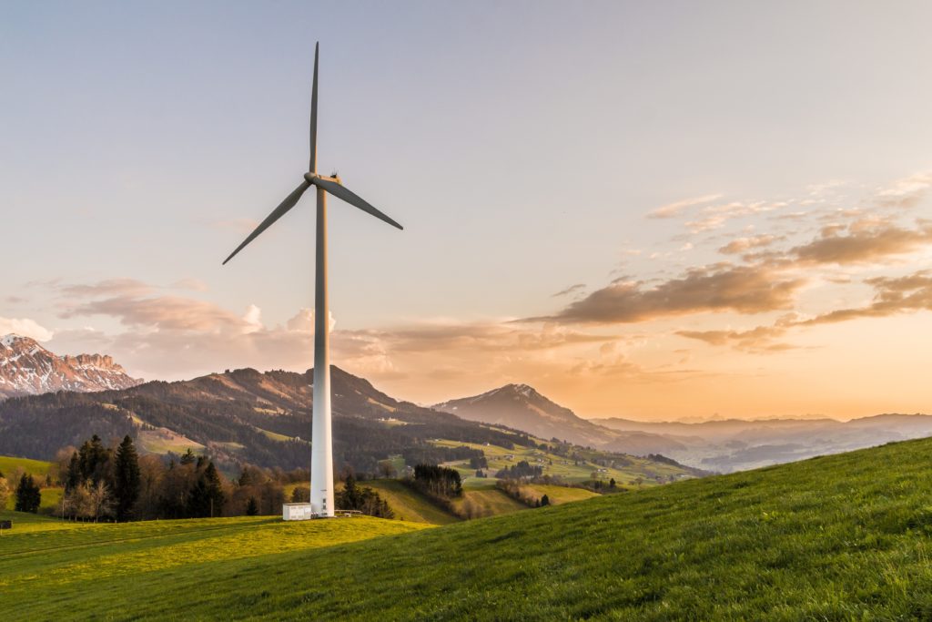 Sustainable Travel Tips - Pick carbon-neutral countries (Windmill in Germany)
