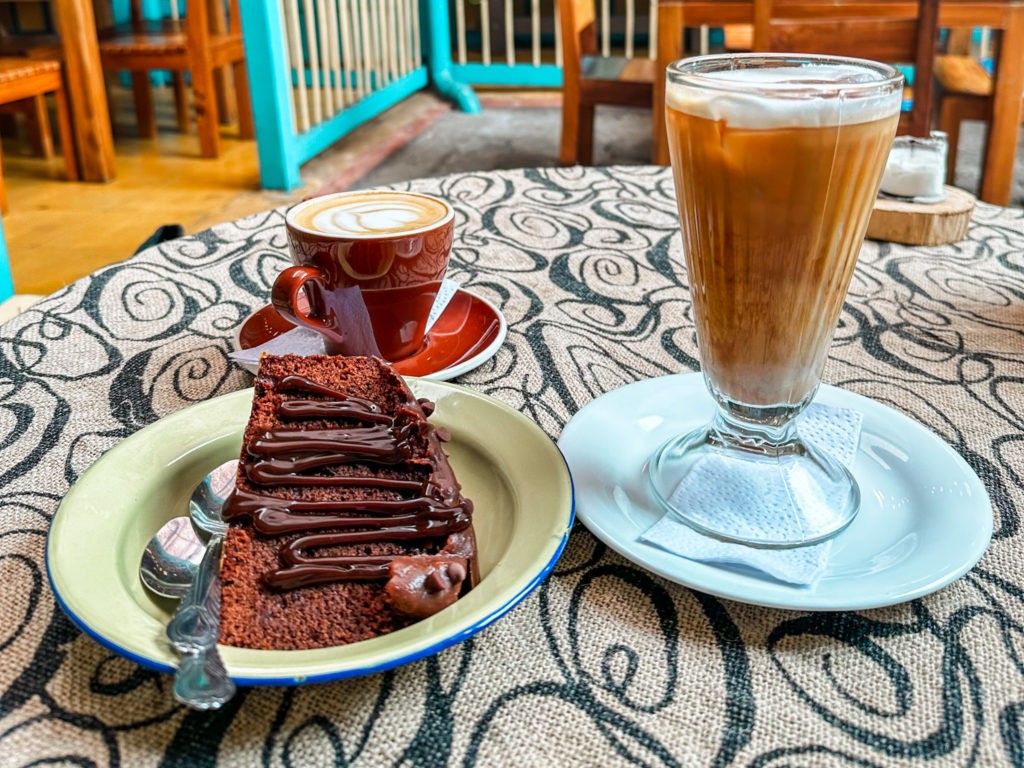 Best Things To Do in Salento - Taste Delicious Colombian Caffee - Two cups of coffee, a cappuchino and cold latte, with a chocolate cake