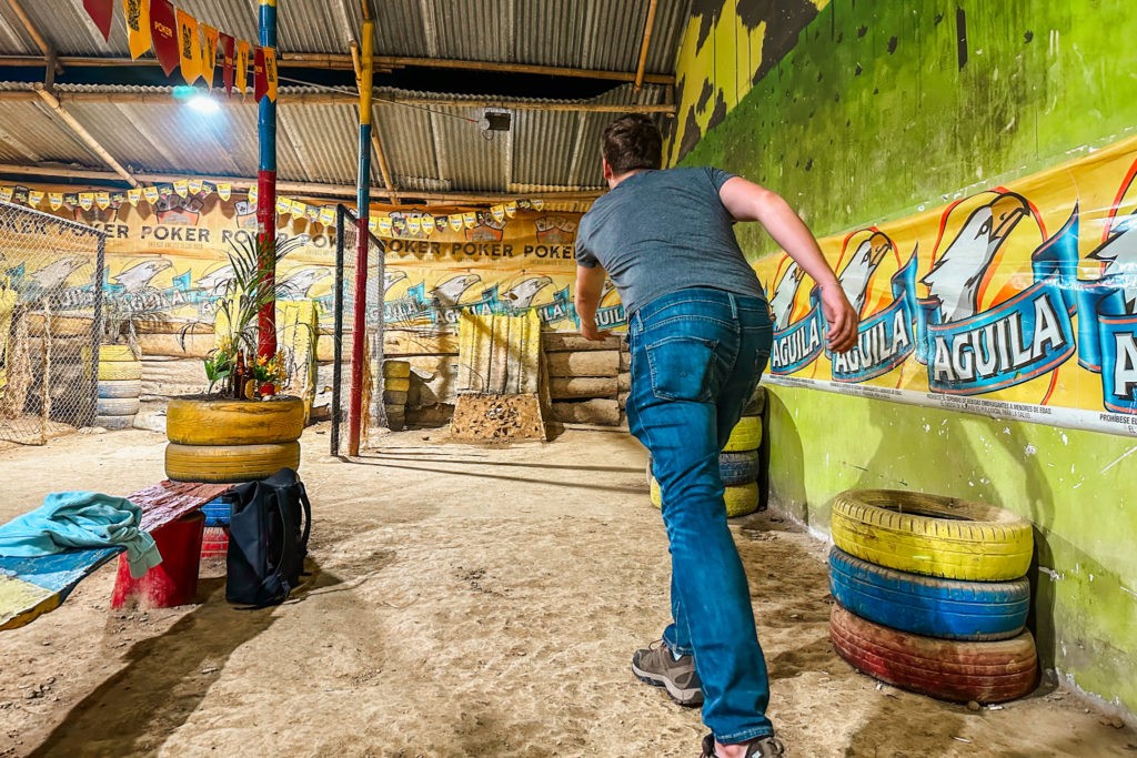 Best Things To Do in Salento - Playing Tejo in Salento, Colombia - Man throwing a tejo