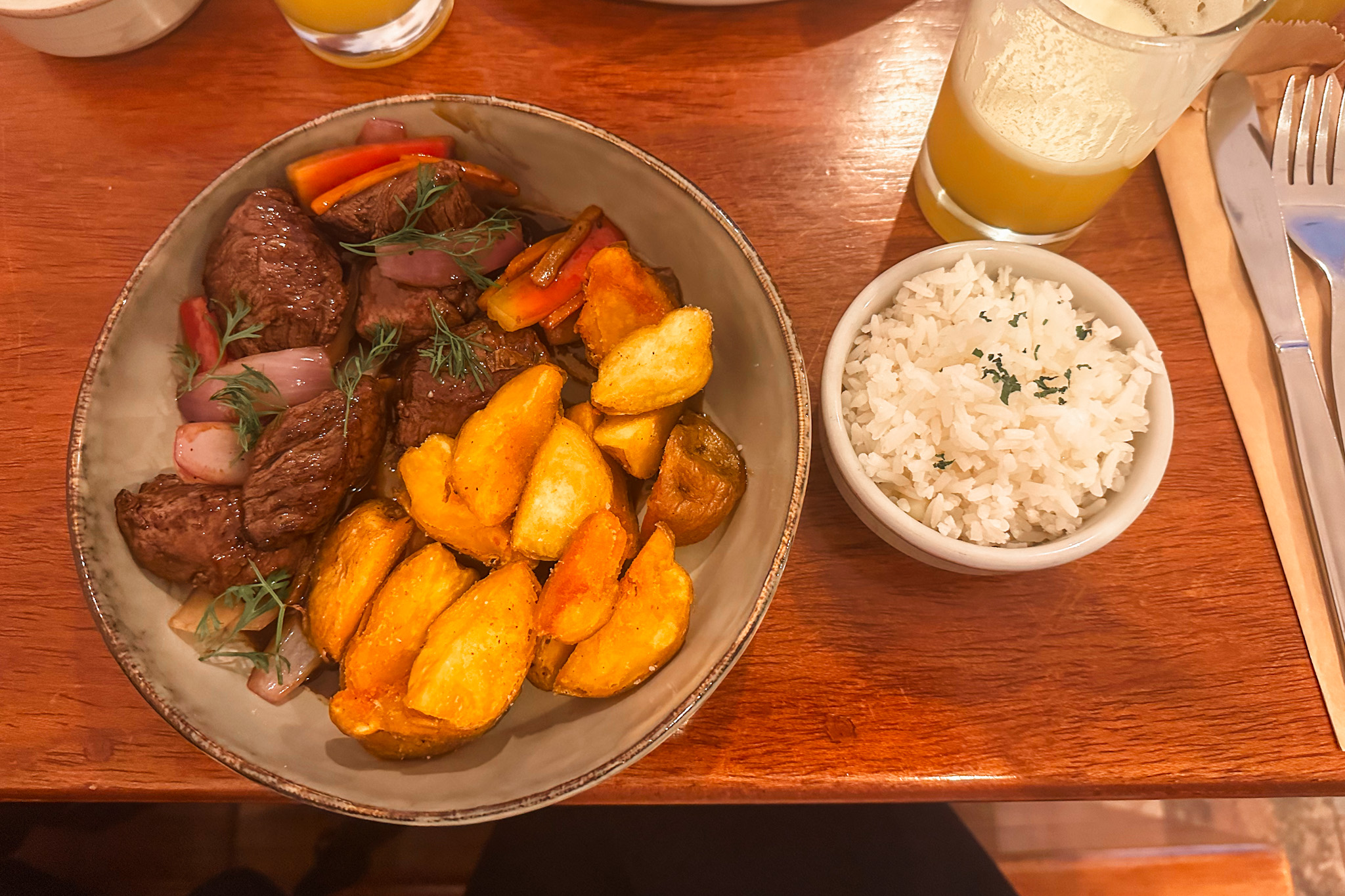 Best Things to Do in Lima - Delicious Lomo Saltado Dish