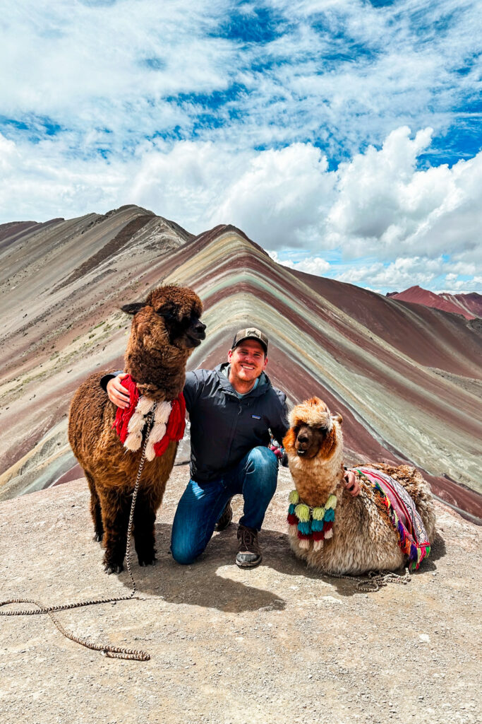 How to avoid altitude sickness in Peru: Rainbow Mountain with alpacas